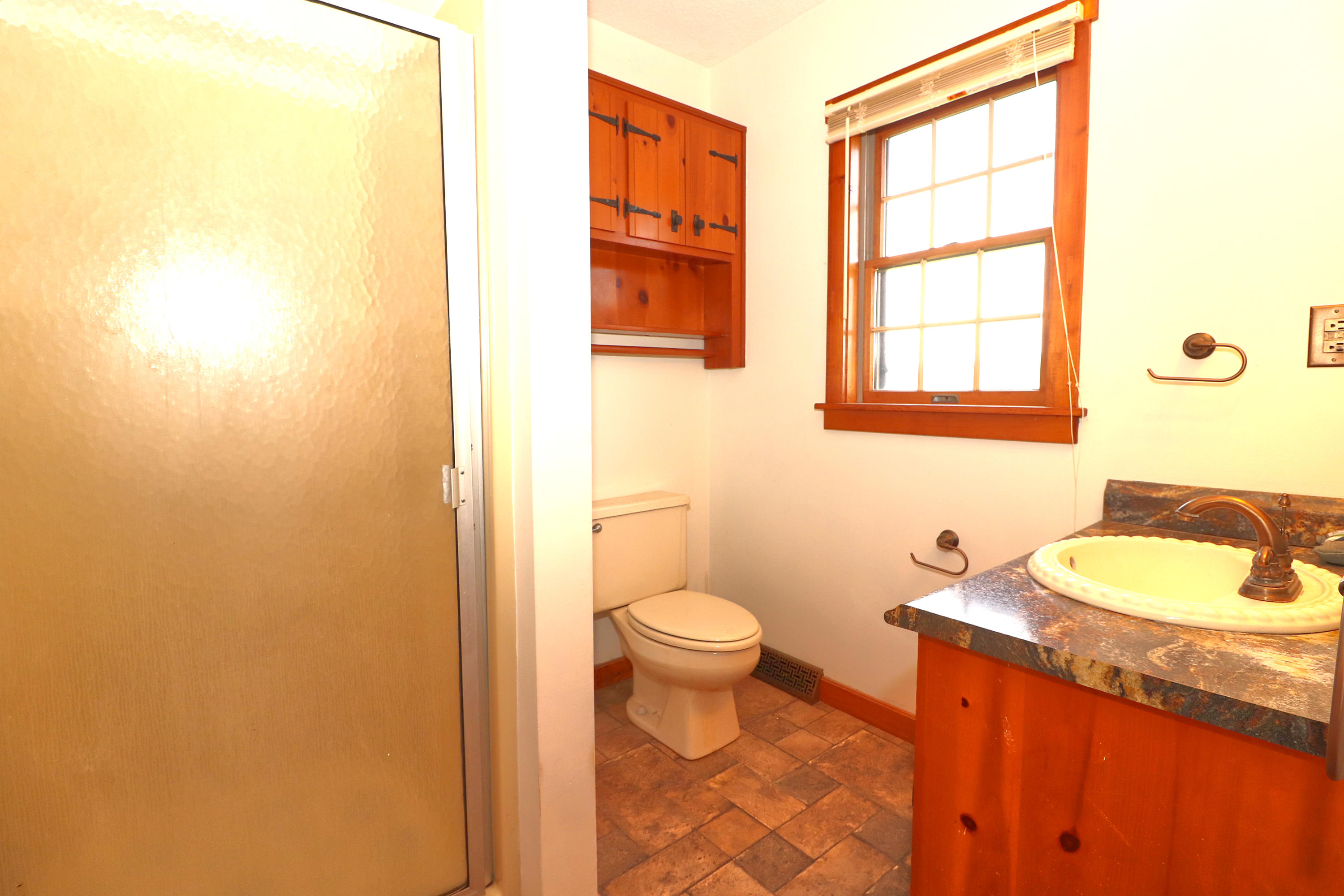 485 Haw Patch Road Ferrum, VA 24088 - Photo 21 of 23 a bathroom with a toilet sink and mirror