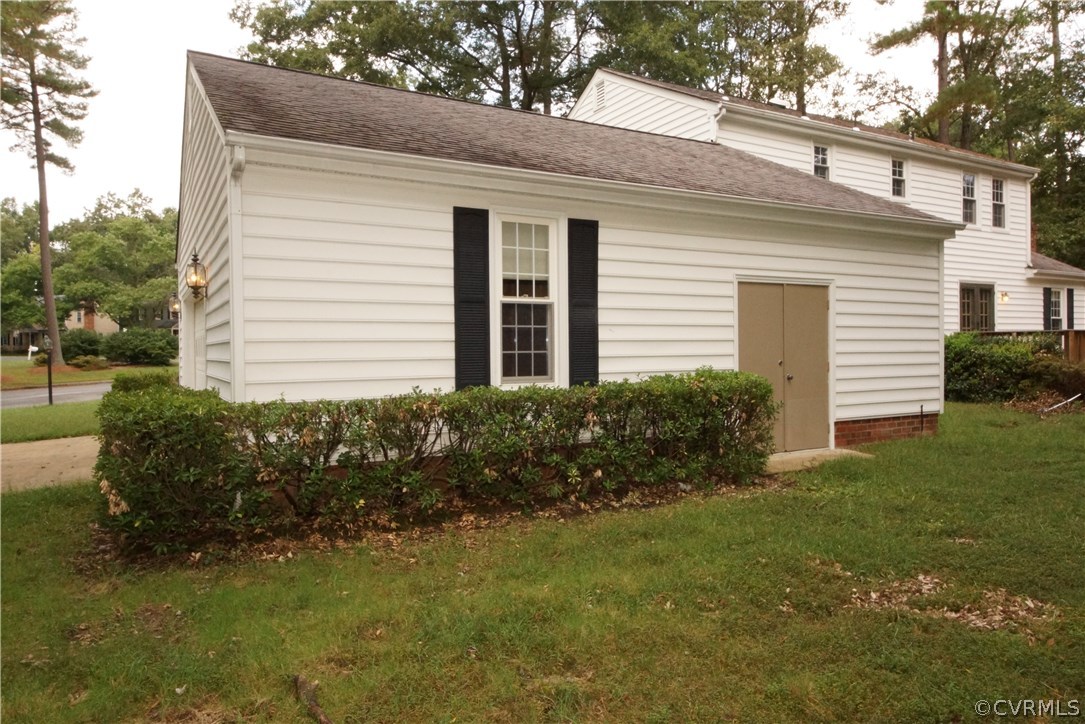 10407 Warren Road Glen Allen, VA 23060 - Photo 21 of 25 Side view of garage with double door entry into wo
