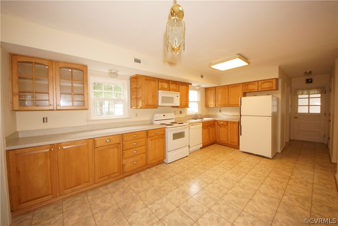 10407 Warren Road Glen Allen, VA 23060 - Photo 9 of 25 Kitchen with tons of newer cabinets