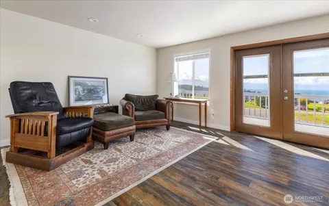 a living room with furniture and windows