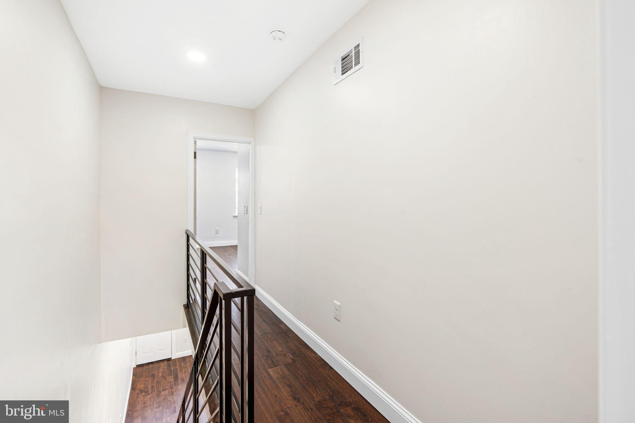 1535 South Mole Street Philadelphia, PA 19146 - Photo 18 of 28 a view of entryway with wooden floor