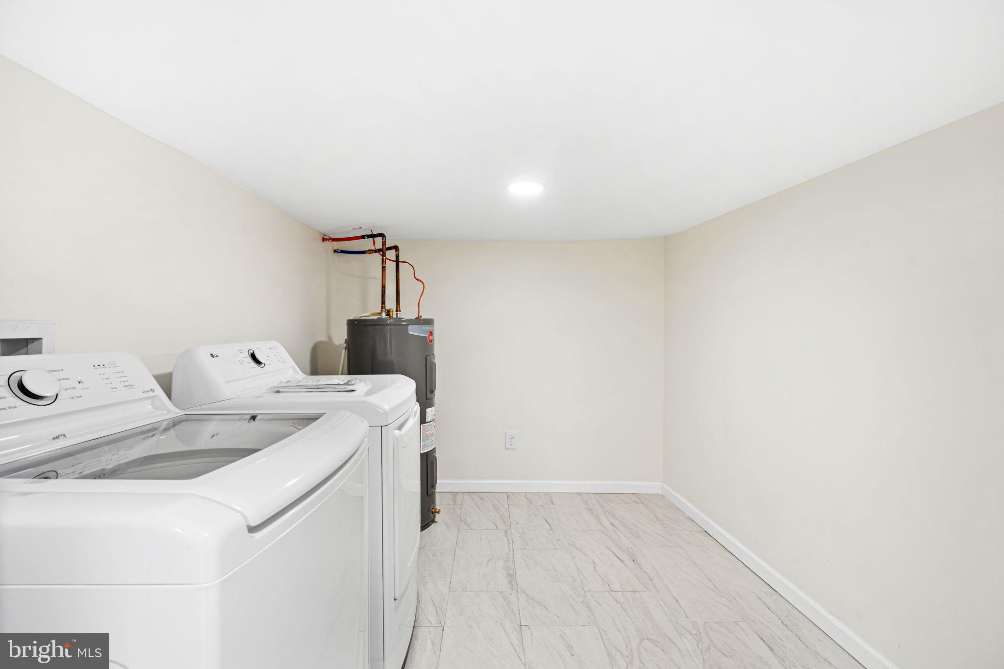 1535 South Mole Street Philadelphia, PA 19146 - Photo 24 of 28 a utility room with dryer and washer
