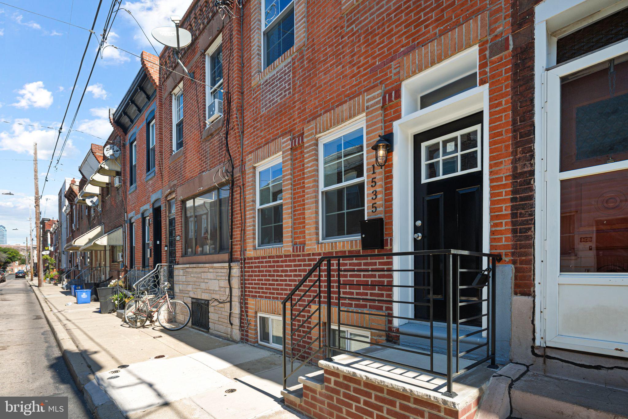 1535 South Mole Street Philadelphia, PA 19146 - Photo 28 of 28 a view of a brick building with many windows