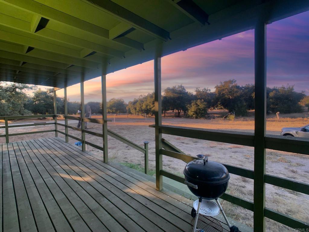 24352 Featherstone Canyon Road Lakeside, CA 92040 - Photo 19 of 72 a view of a porch with wooden floor