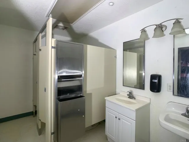 a outdoor space with lots of furniture and shower