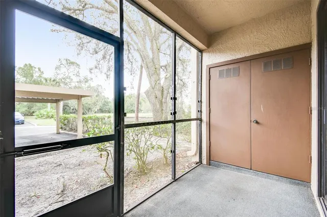 a view of an empty room and window