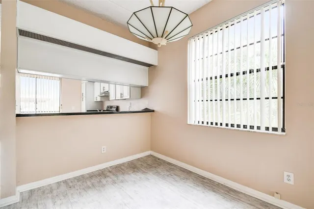 a view of a kitchen with a window