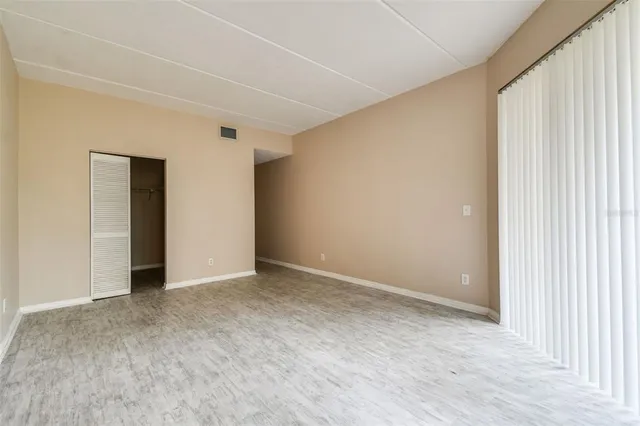 a view of an empty room and window