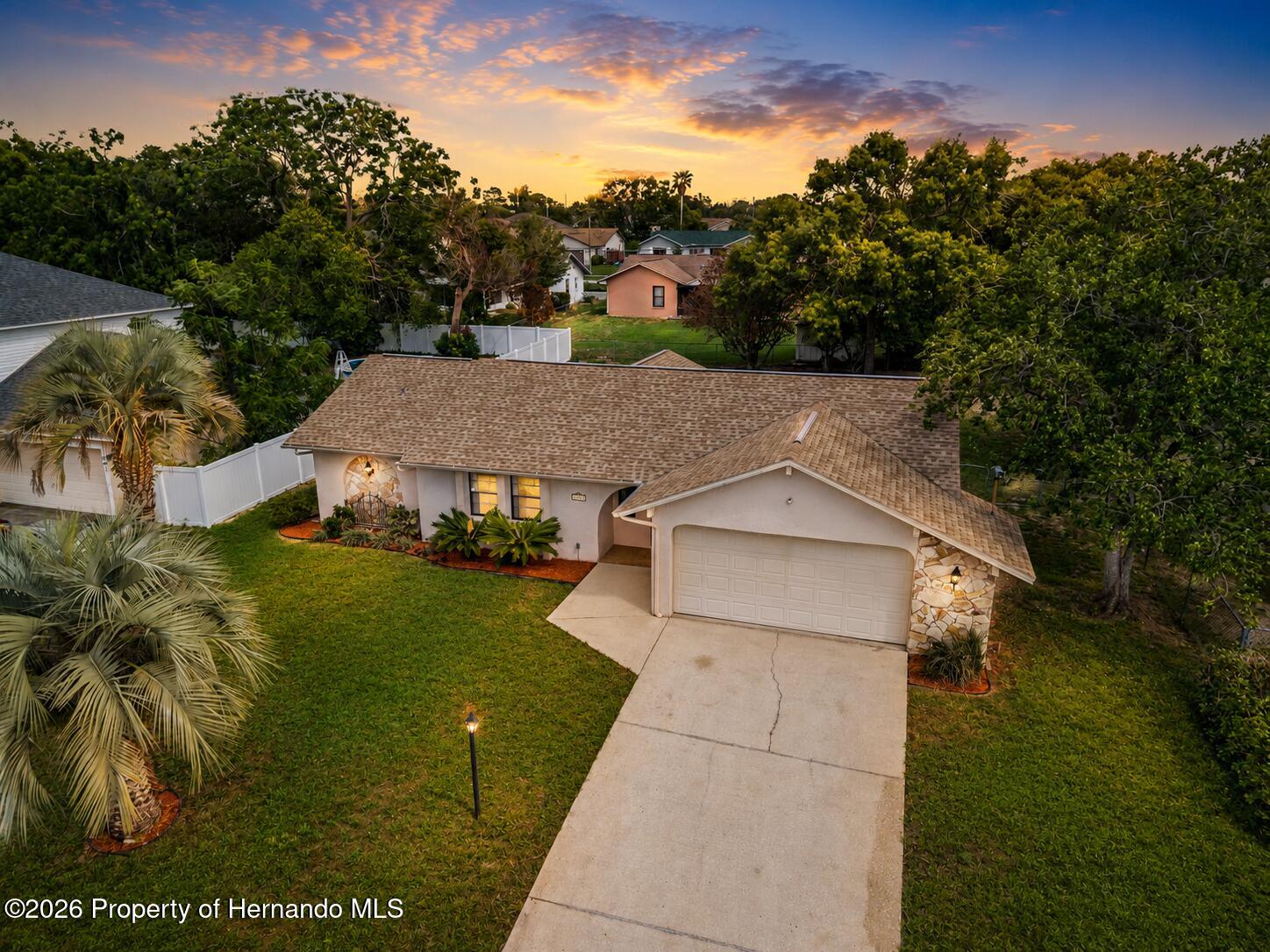 11312 Sedgefield Avenue Spring Hill, FL 34608 - Photo 4 of 28 matures landscaping