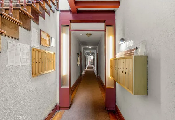 a view of a hallway with a furniture
