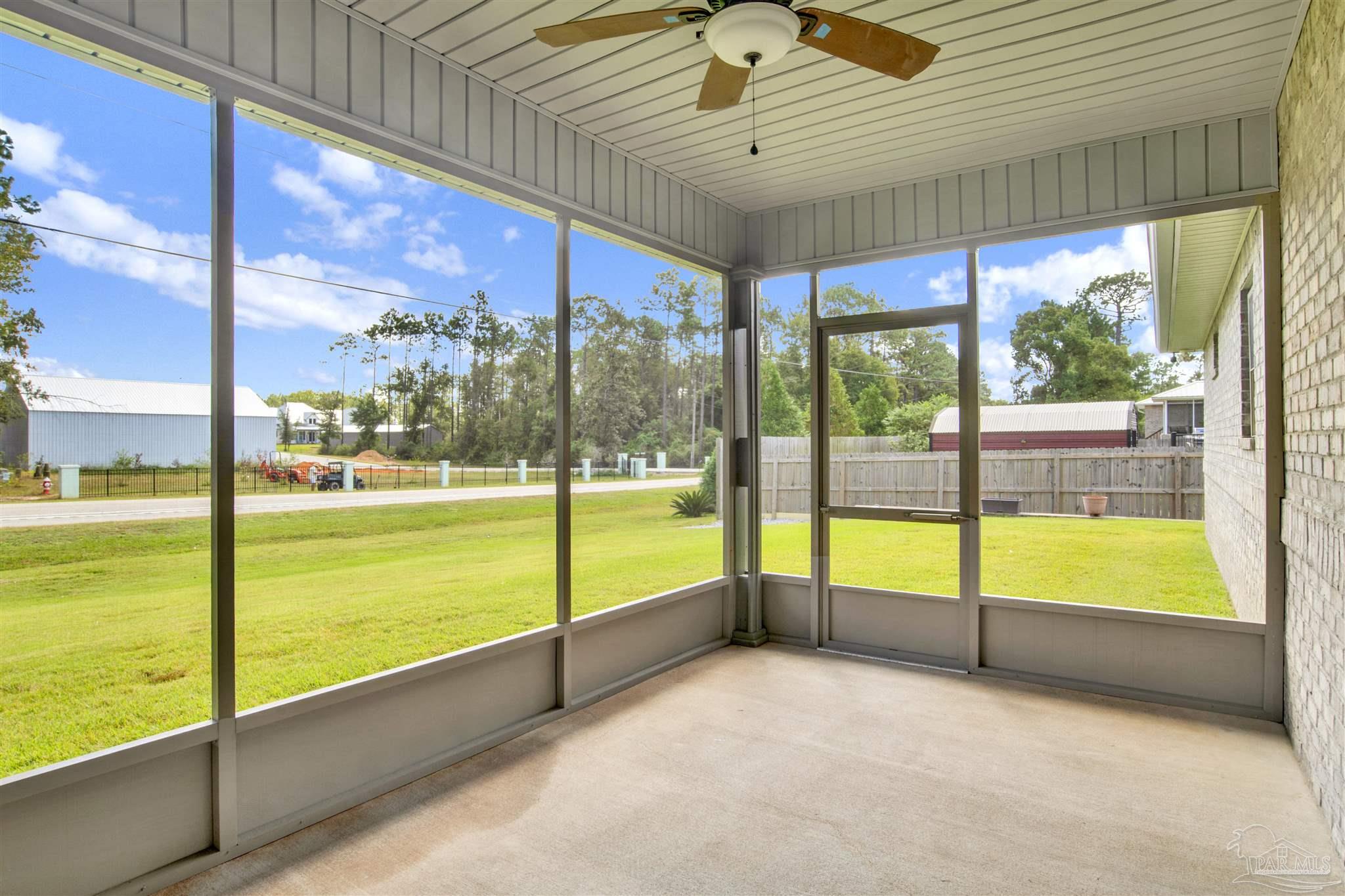 2549 Santa Rosa Drive Lillian, AL 36549 - Photo 16 of 53 a view of an empty room with large windows