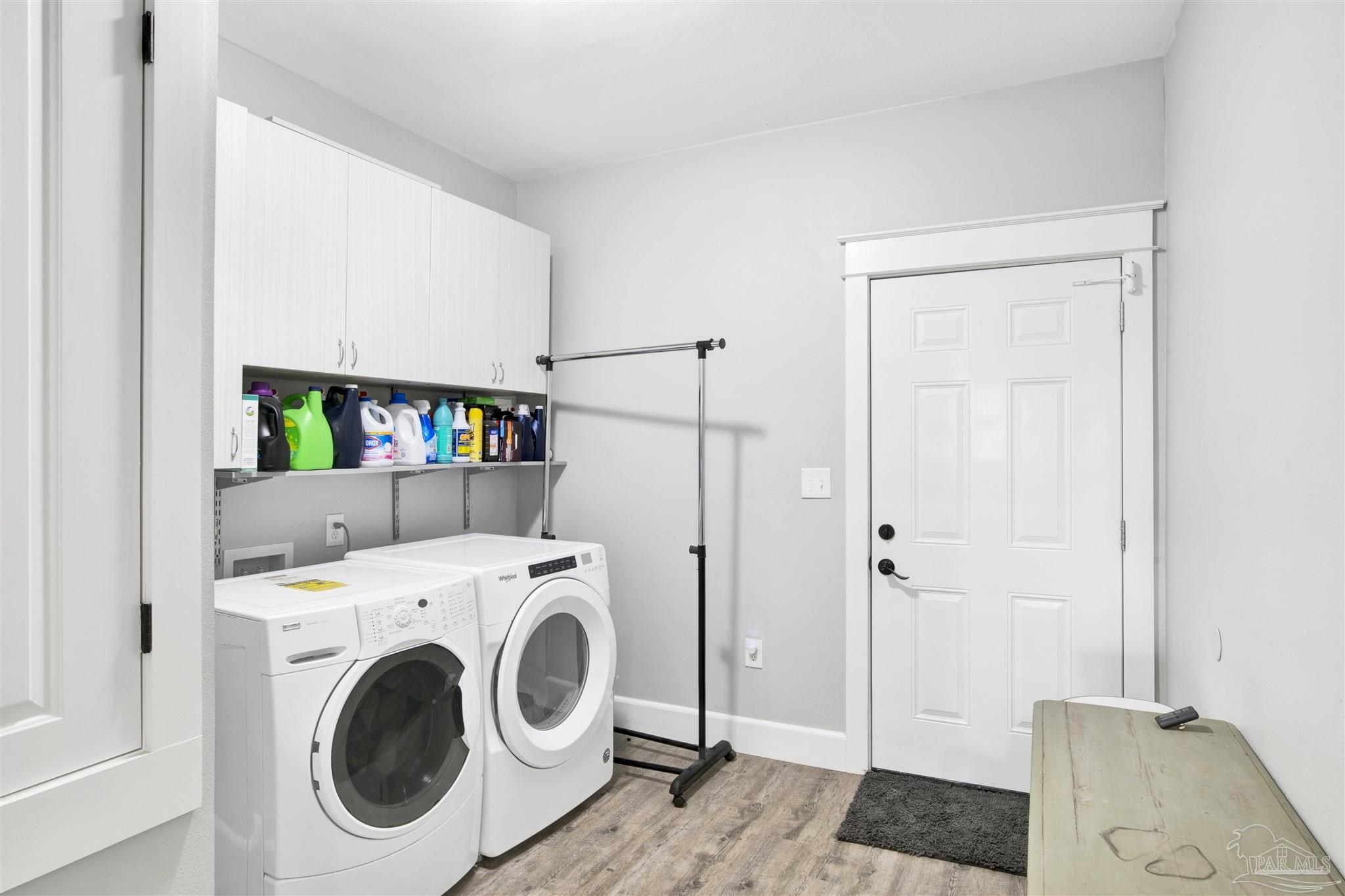 2549 Santa Rosa Drive Lillian, AL 36549 - Photo 25 of 53 a view of a storage & utility room with washer and dryer
