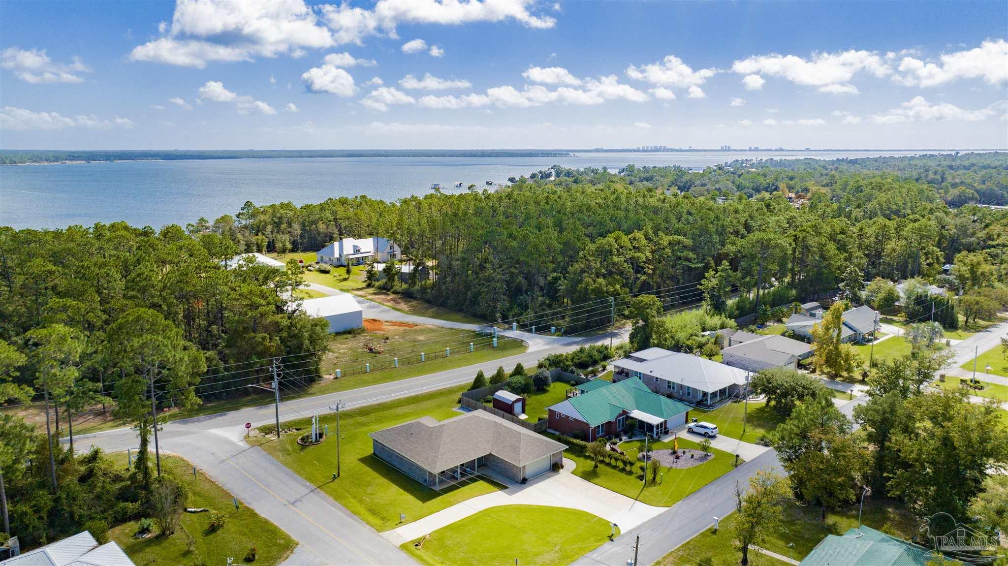 2549 Santa Rosa Drive Lillian, AL 36549 - Photo 44 of 53 an aerial view of a house with swimming pool and ocean view