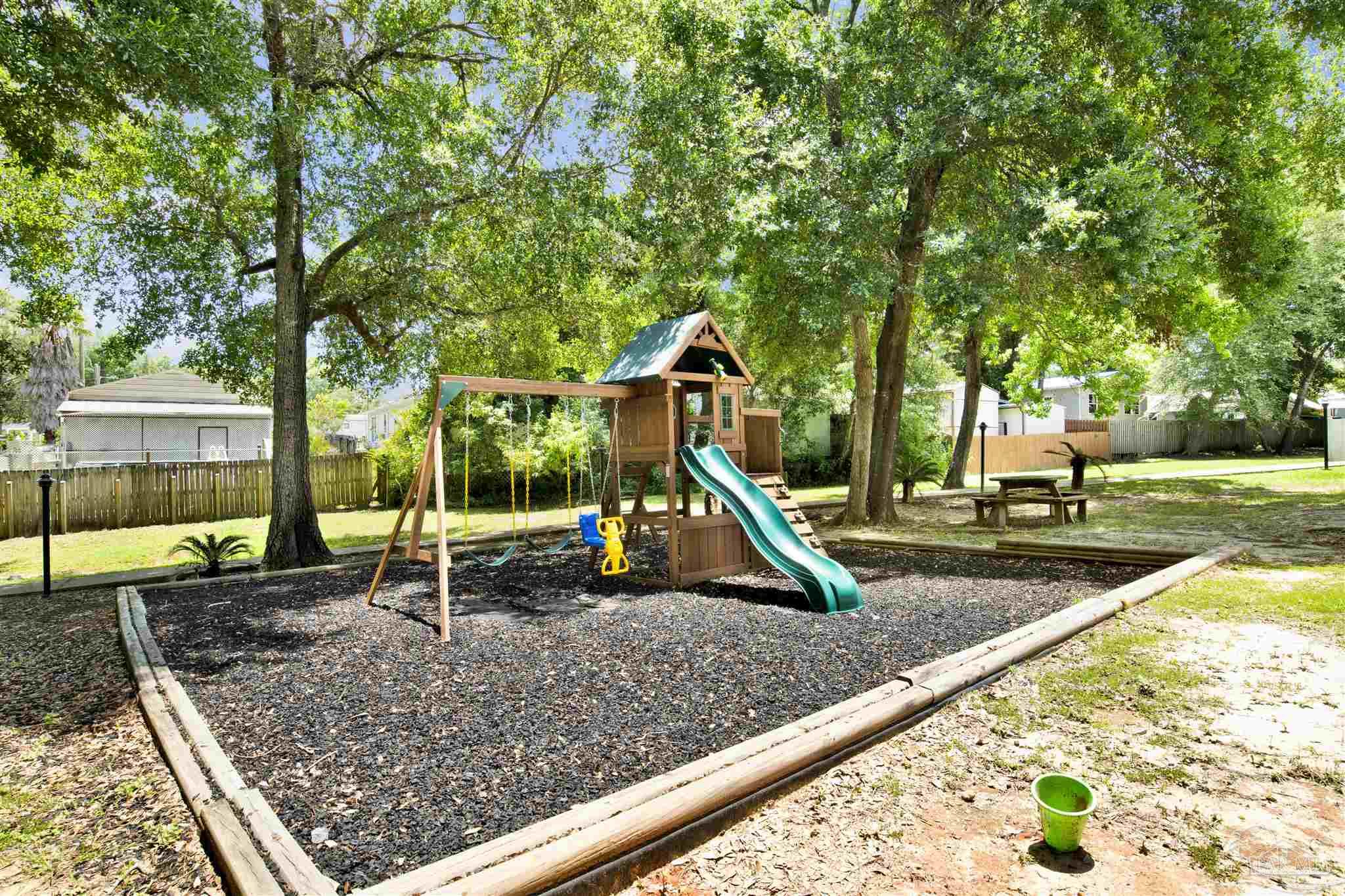 2549 Santa Rosa Drive Lillian, AL 36549 - Photo 48 of 53 a view of a backyard with a tree