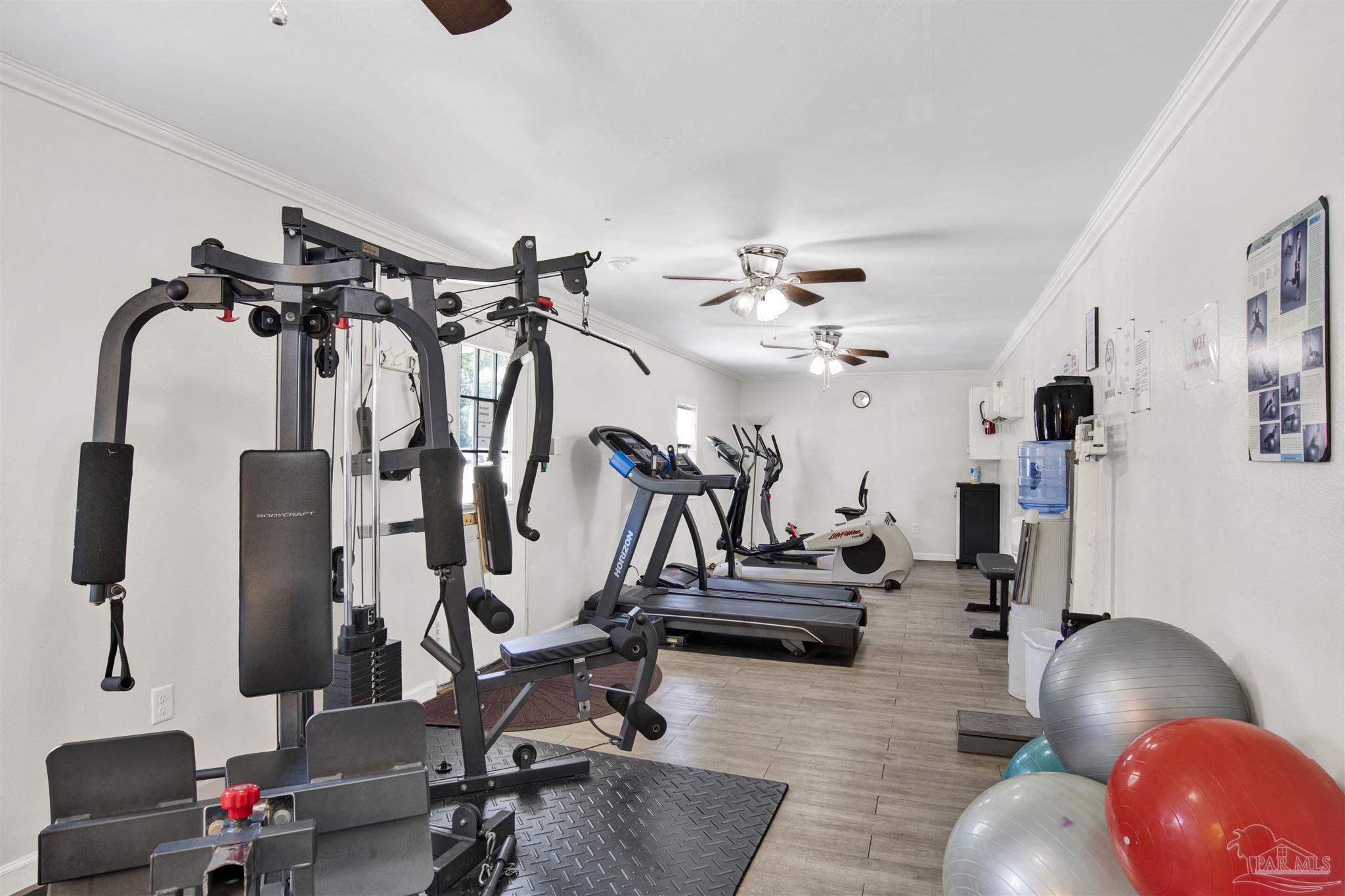 2549 Santa Rosa Drive Lillian, AL 36549 - Photo 49 of 53 a view of a room with gym equipment