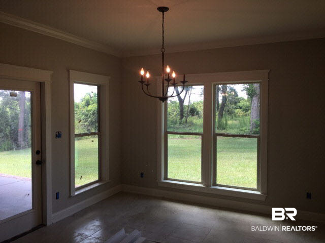 12320 Stroh Road Daphne, AL 36527 - Photo 6 of 17 Large breakfast nook with lots of natural light and a great view of the backyard