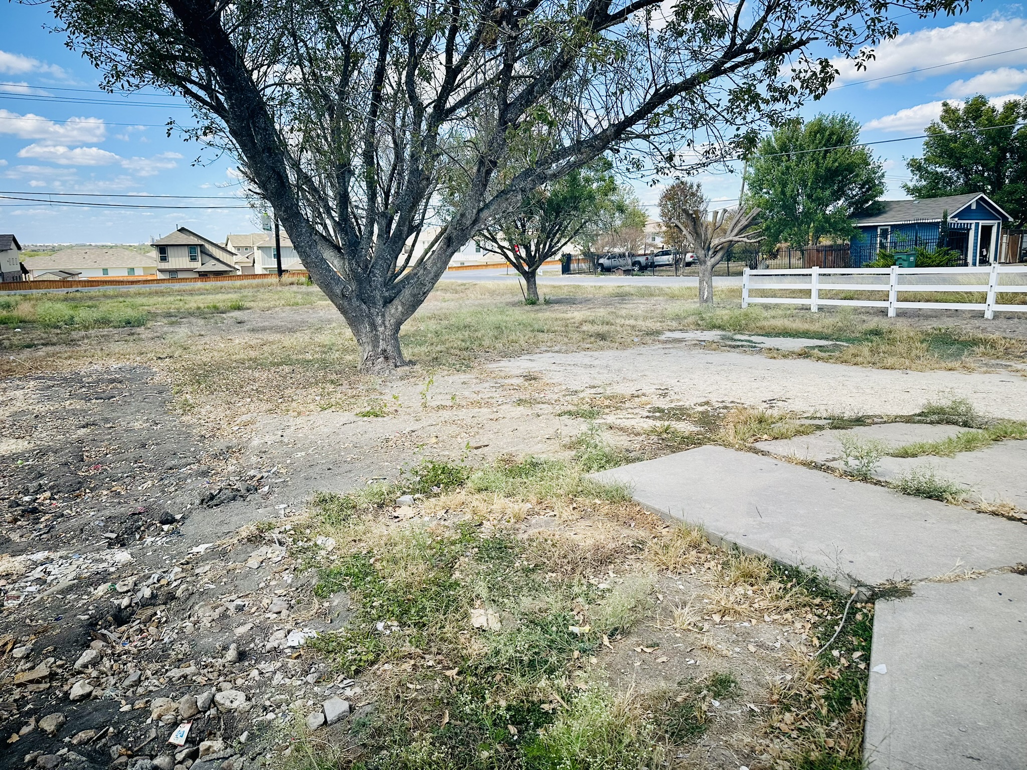 100 Cody Lane Kyle, TX 78640 - Photo 17 of 19 View of yard to street corner of Cody Lane and Goforth Road.