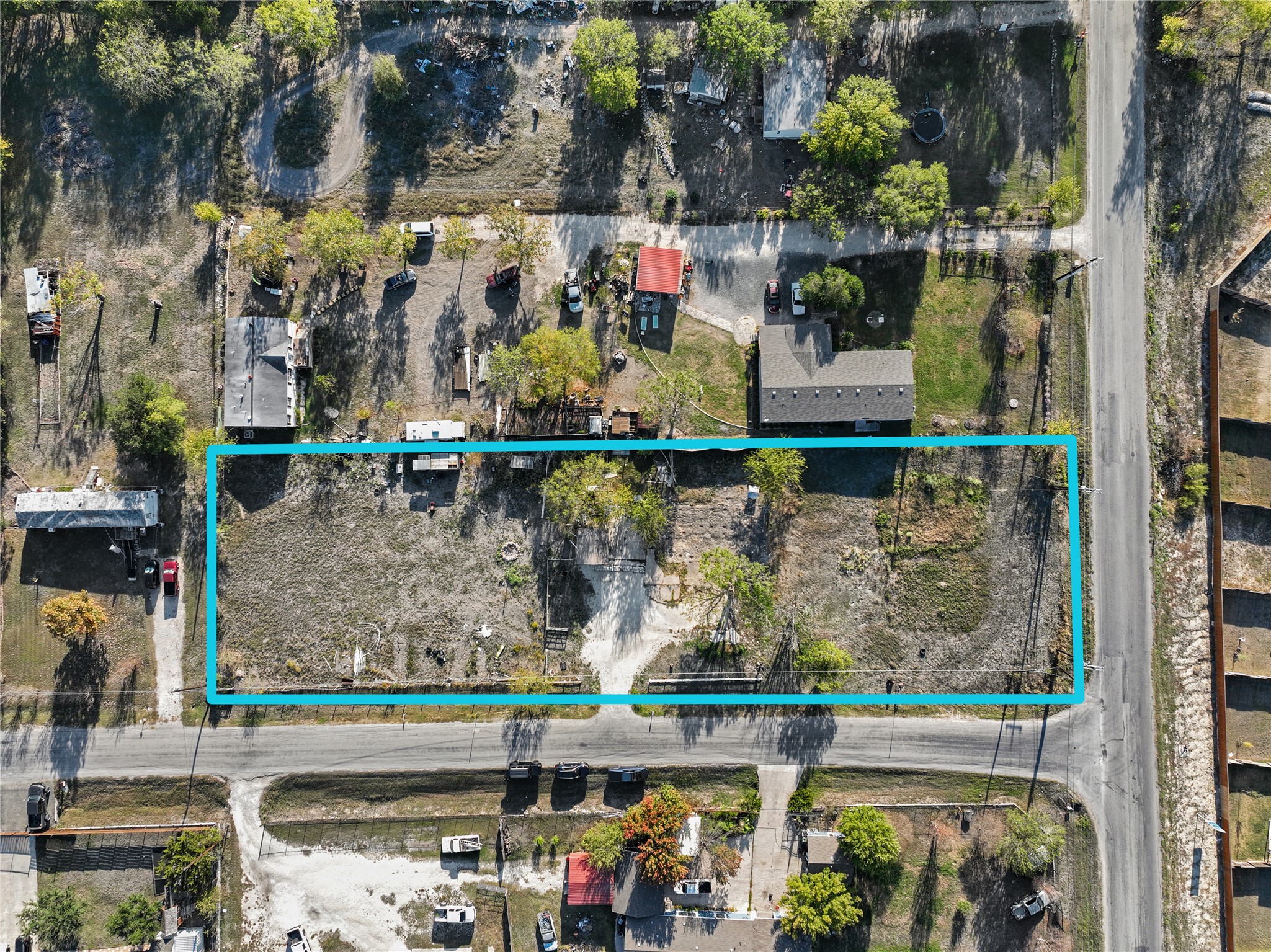 100 Cody Lane Kyle, TX 78640 - Photo 3 of 19 Aerial view of property's location featuring property boundaries highlighted.