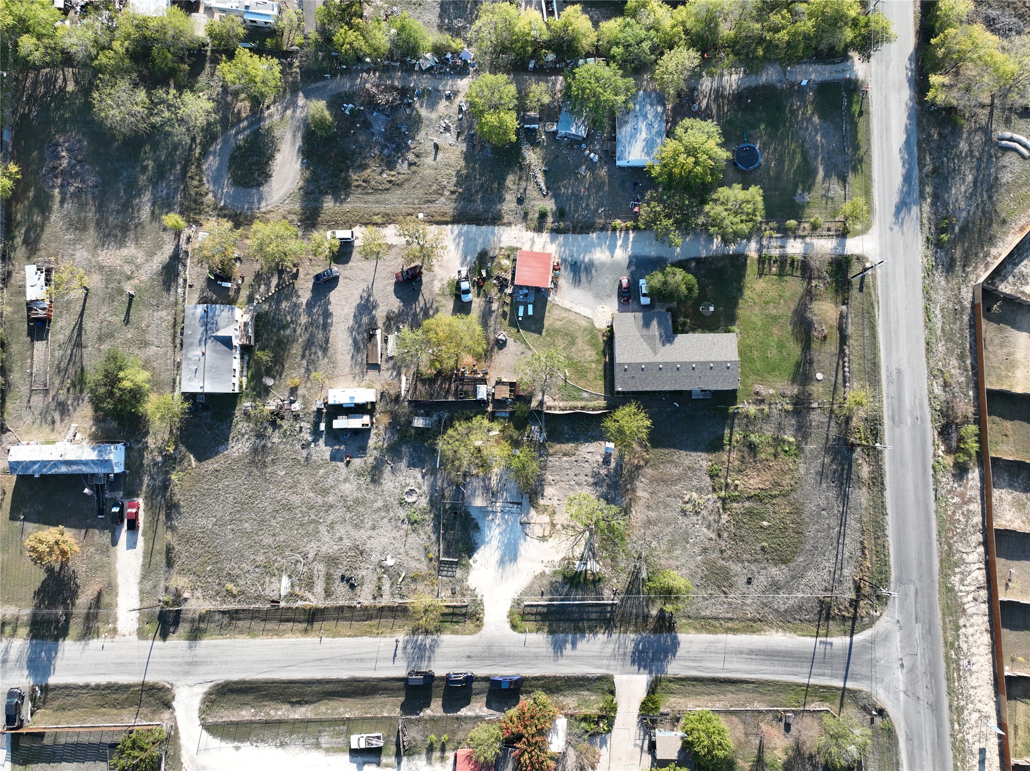 100 Cody Lane Kyle, TX 78640 - Photo 4 of 19 Aerial view. Bottom half is the property, from driveway on left to Goforth Rd. on the right. Street at bottom is Cody Lane.