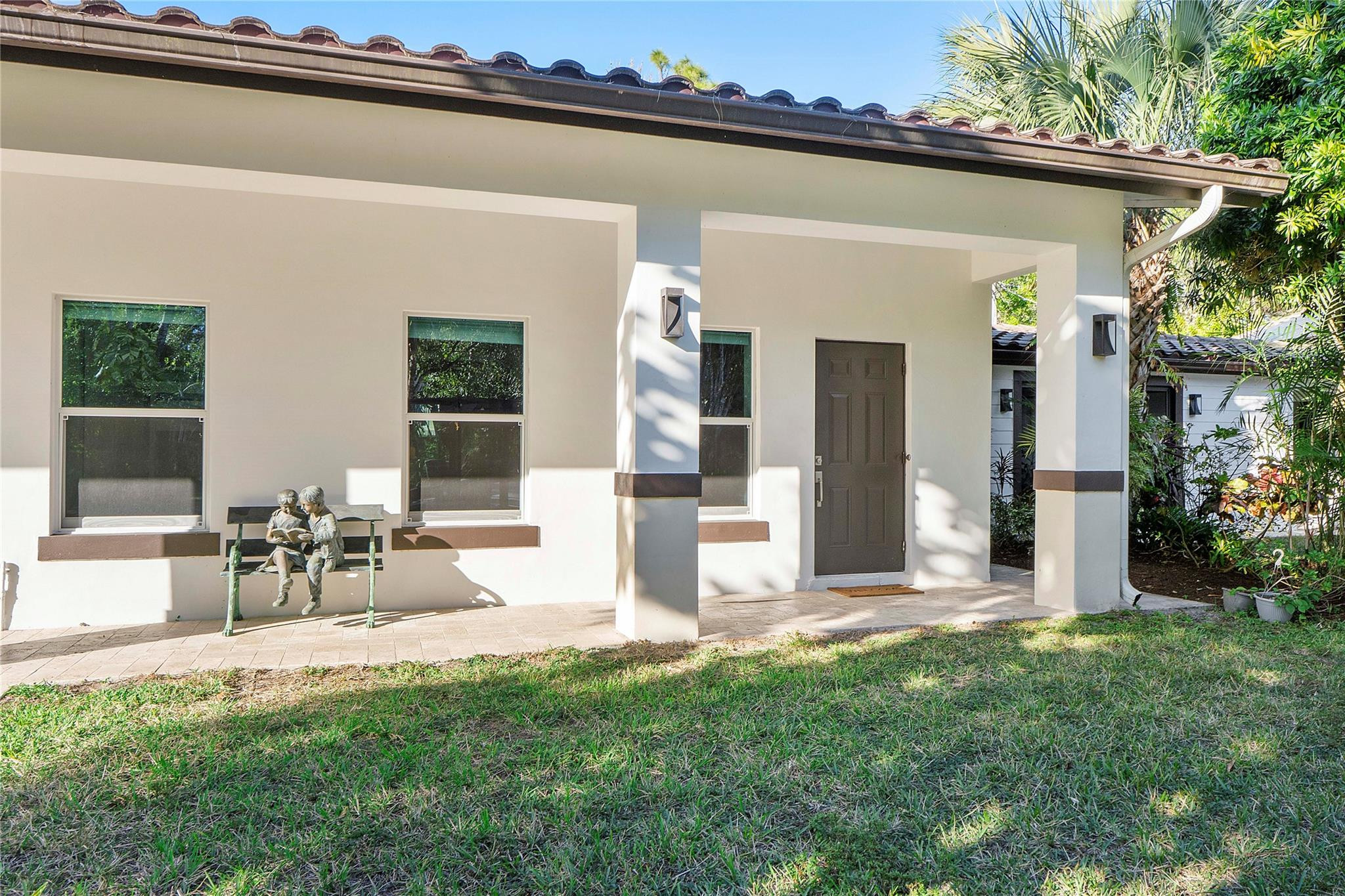 5351 Godfrey Road Parkland, FL 33067 - Photo 56 of 95 a view of a house with backyard and sitting area