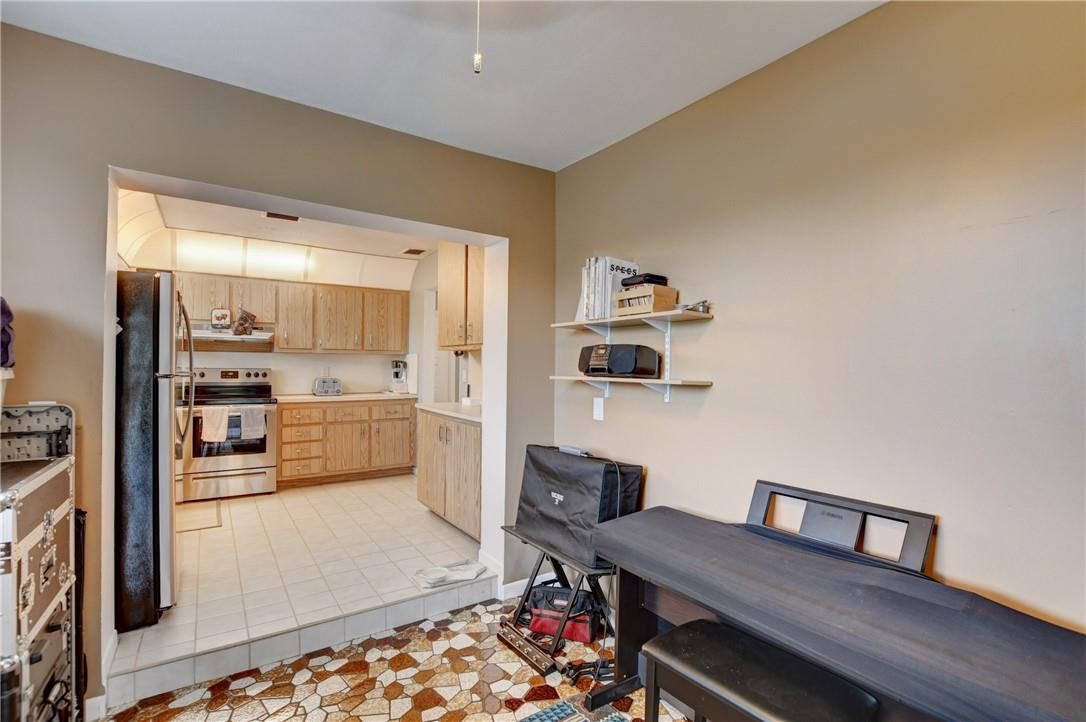 9285 Southwest 5th Street, Unit C Boca Raton, FL 33428 - Photo 22 of 31 a living room with furniture and a table