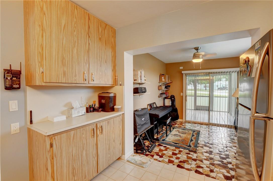 9285 Southwest 5th Street, Unit C Boca Raton, FL 33428 - Photo 24 of 31 a very nice looking room with a large window