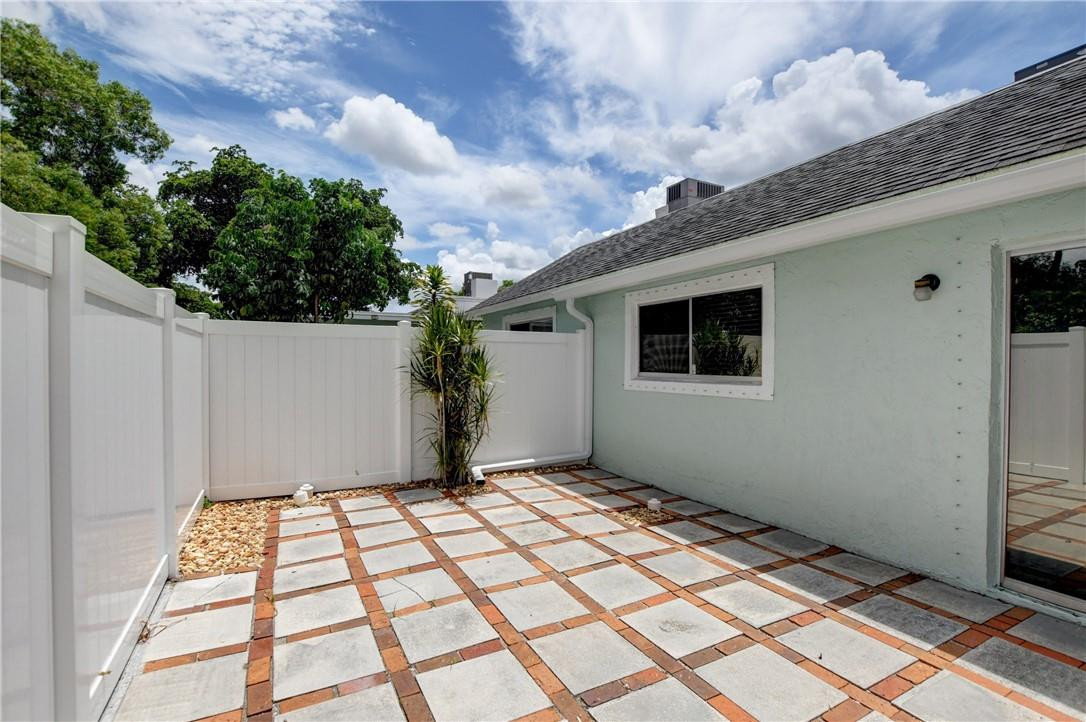 9285 Southwest 5th Street, Unit C Boca Raton, FL 33428 - Photo 8 of 31 a front view of a house