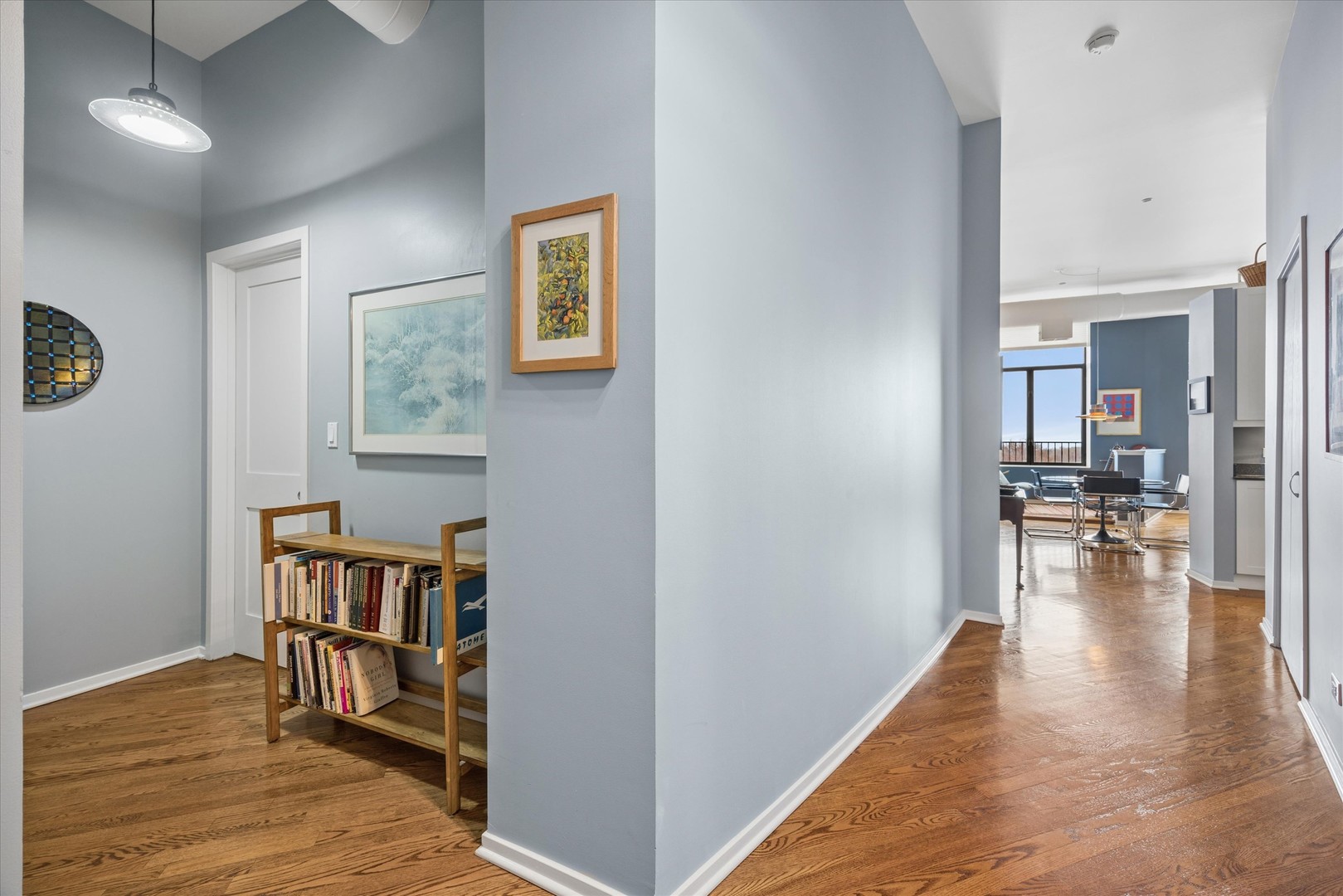 910 South Michigan Avenue, Unit 501 Chicago, IL 60605 - Photo 14 of 21 a view of a livingroom with furniture and wooden floor