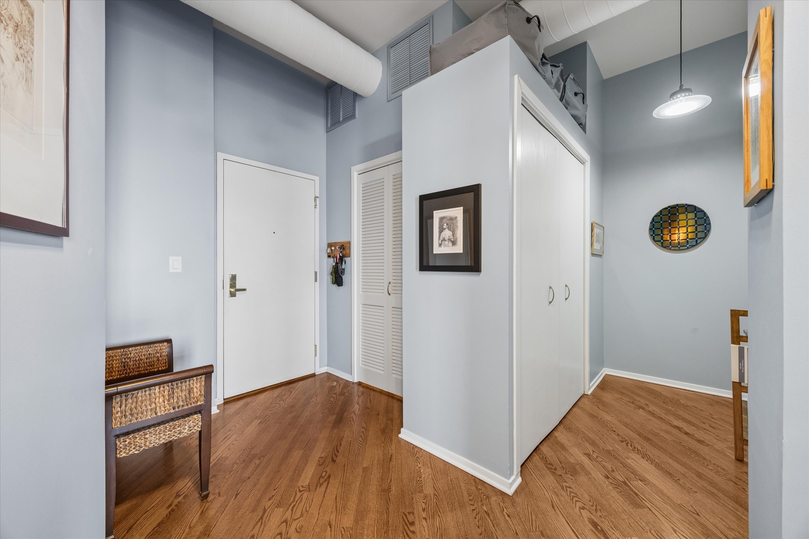 910 South Michigan Avenue, Unit 501 Chicago, IL 60605 - Photo 15 of 21 a view of a livingroom with wooden floor