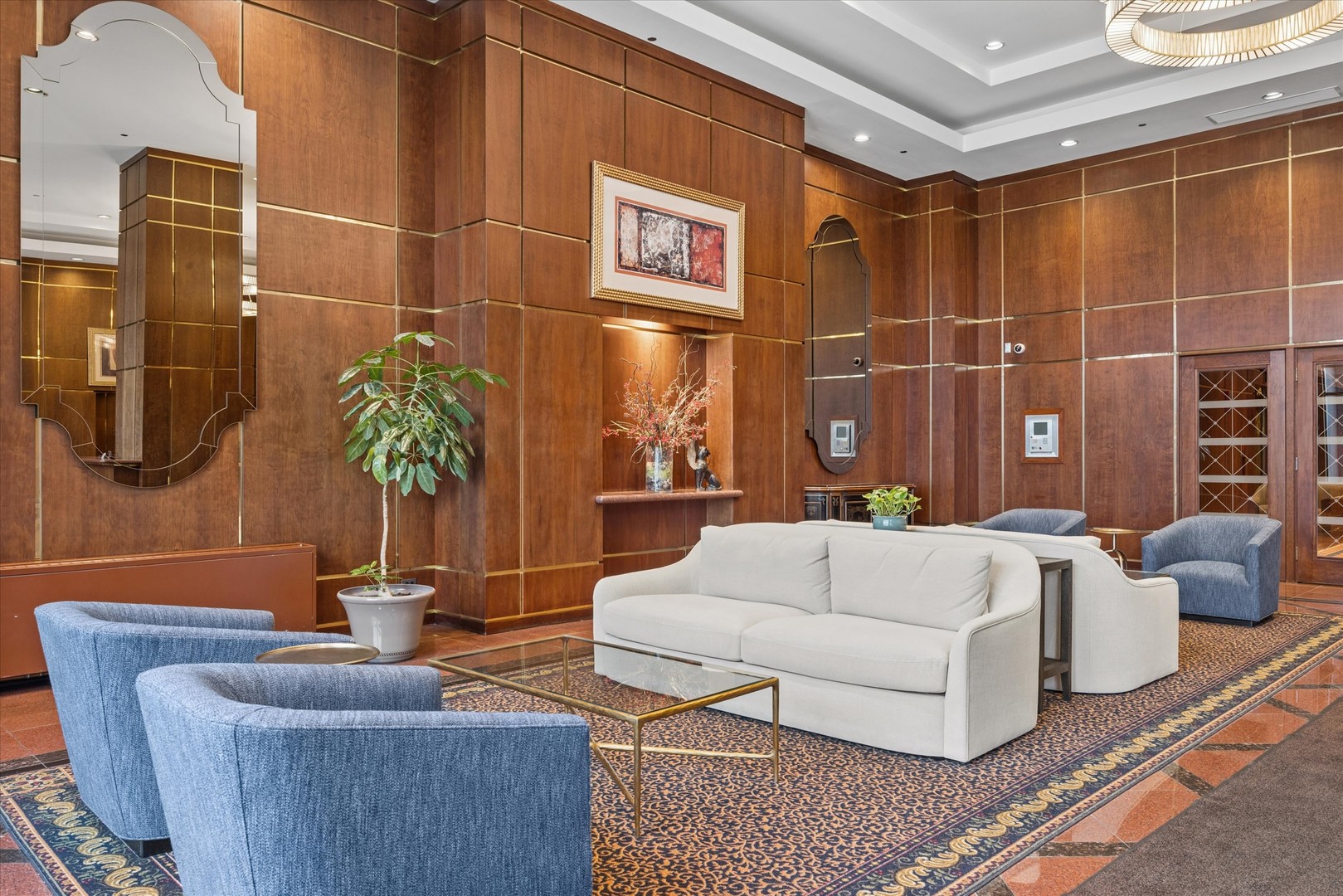 910 South Michigan Avenue, Unit 501 Chicago, IL 60605 - Photo 2 of 21 a living room with furniture and potted plant