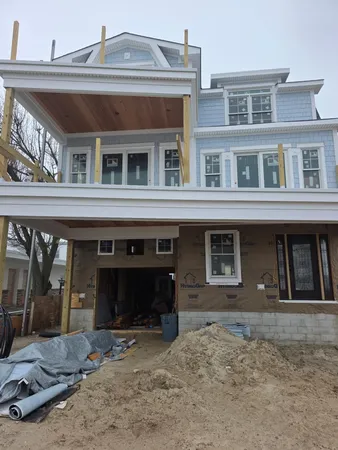 a front view of a house with parking