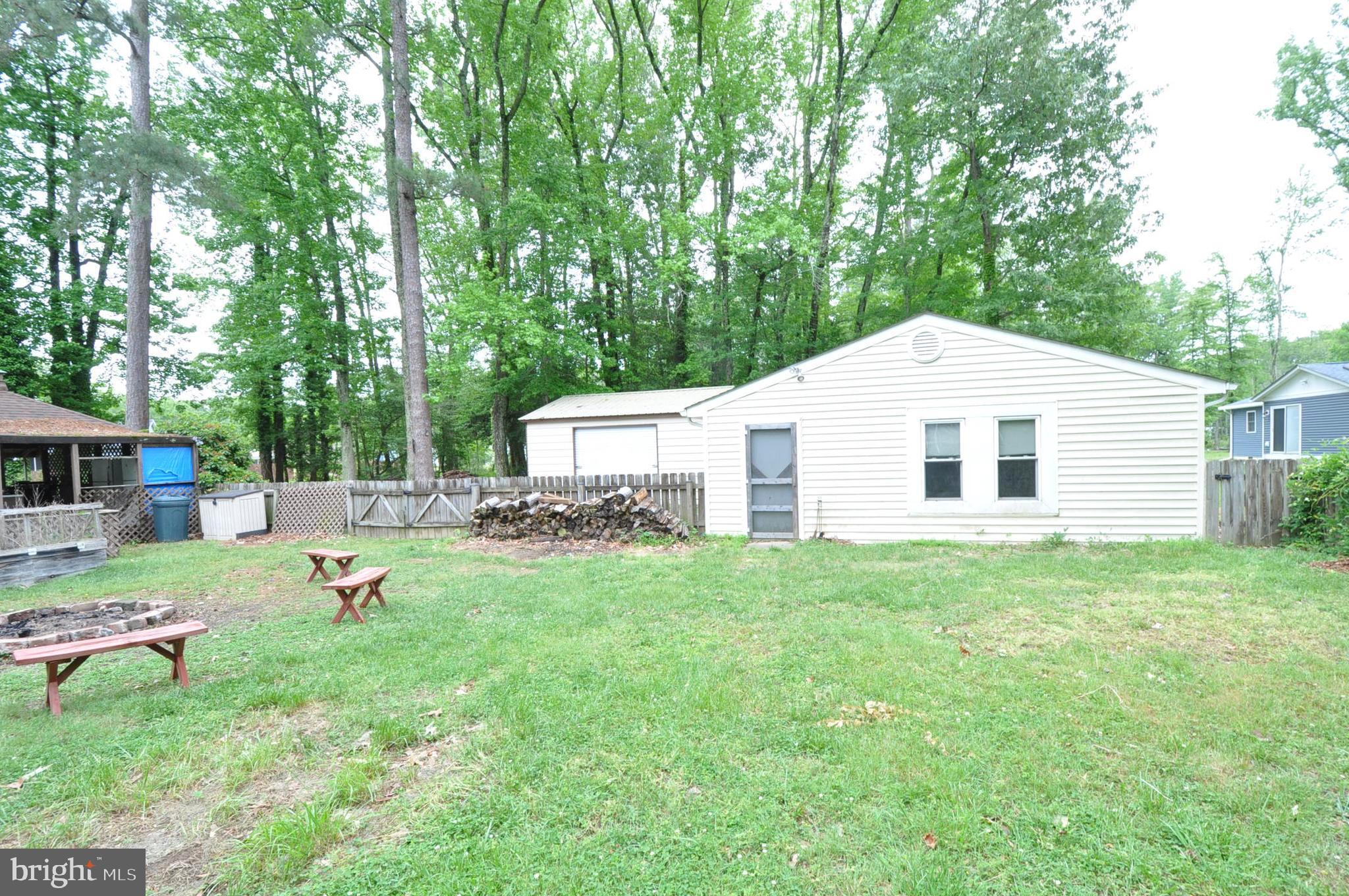 797 Forest Grove Road Colonial Beach, VA 22443 - Photo 38 of 40 Rear Yard with Garage