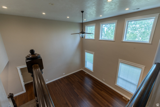 3565 West 1350th Street North Vernal, UT 84078 - Photo 36 of 54 Two-story living area featuring a dark wood-finish floor, recessed lighting, and a ceiling fan