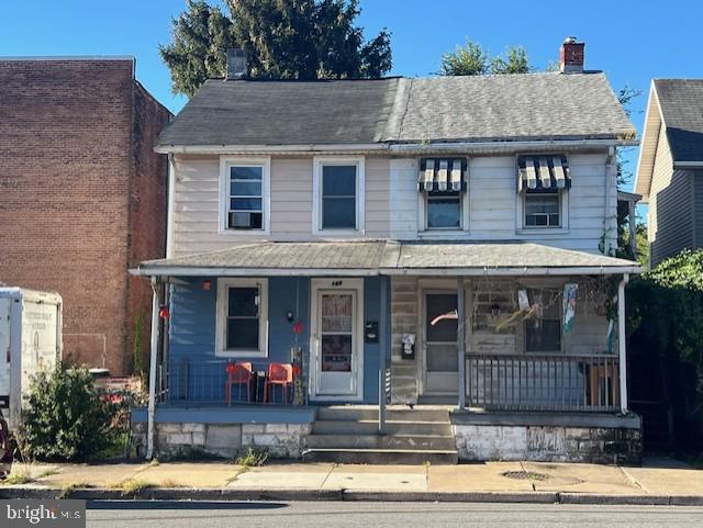 466 North Front Street Steelton, PA 17113 - Photo 1 of 16 a view of a brick house with large windows and plants