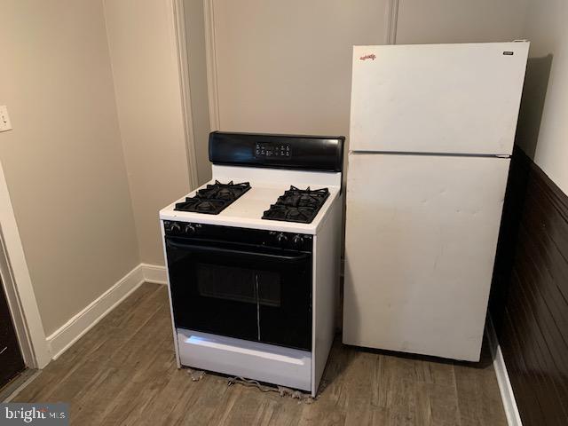 466 North Front Street Steelton, PA 17113 - Photo 6 of 16 a white refrigerator freezer and a wooden floor