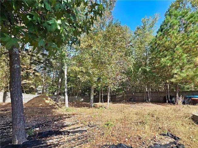 a view of a yard covered in snow