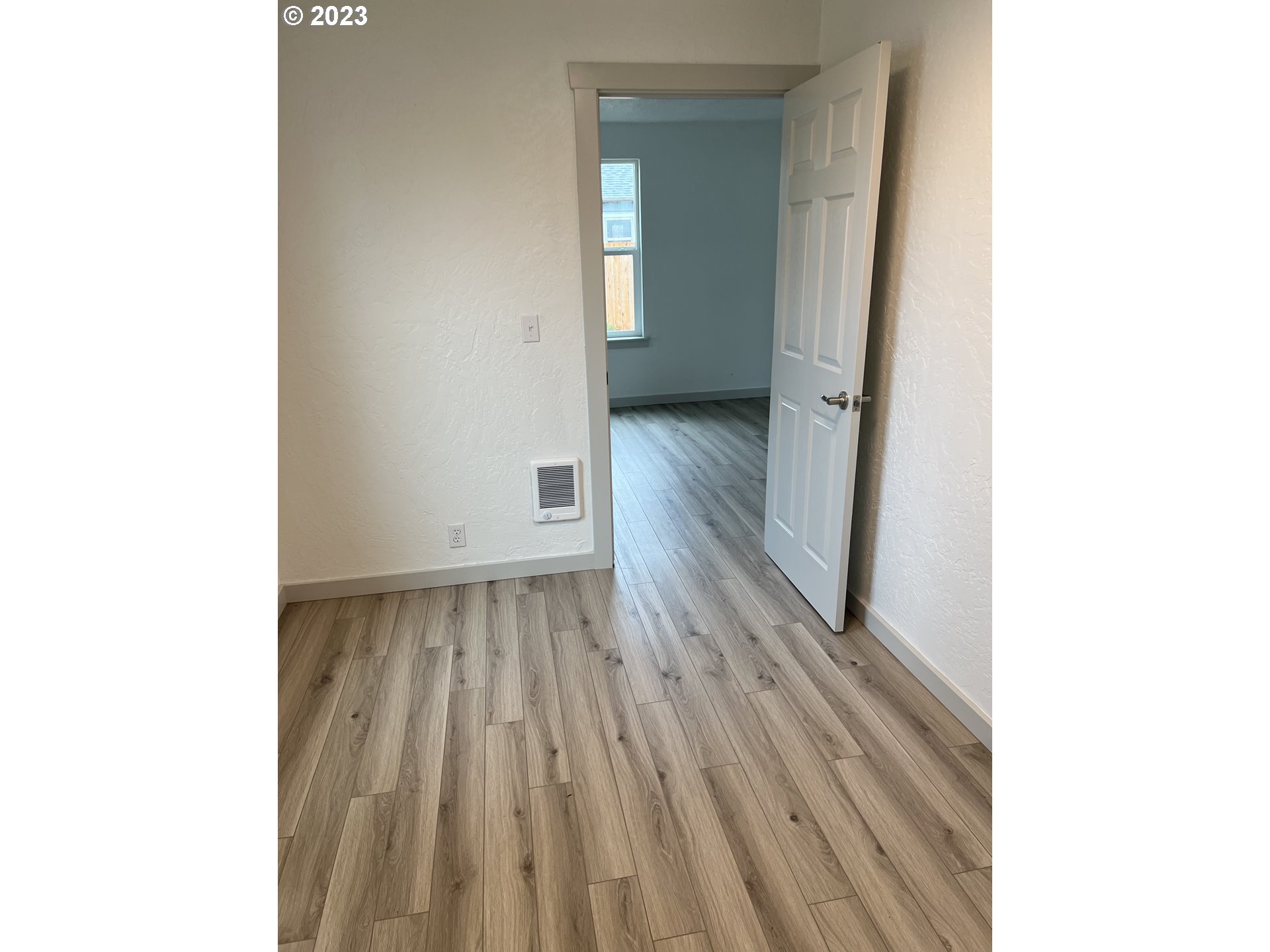 365 North 24th Street Springfield, OR 97477 - Photo 6 of 14 a view of a room with wooden floor
