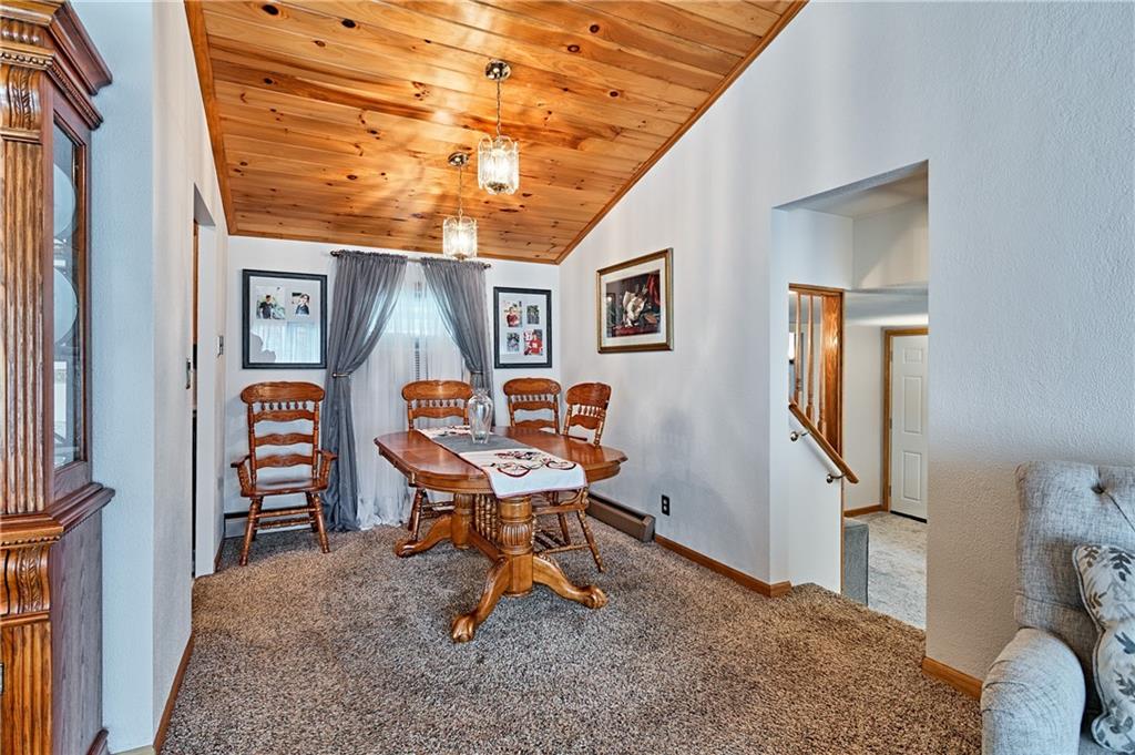 218 Evergreen Mill Road Harmony, PA 16037 - Photo 12 of 25 a living room with furniture a piano and a window