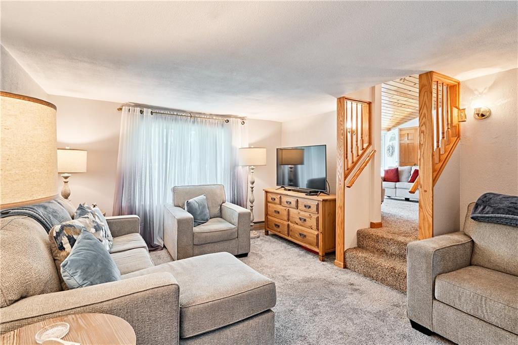 218 Evergreen Mill Road Harmony, PA 16037 - Photo 13 of 25 a living room with furniture and a large window