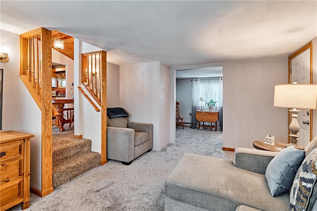218 Evergreen Mill Road Harmony, PA 16037 - Photo 14 of 25 a living room with furniture and a couch