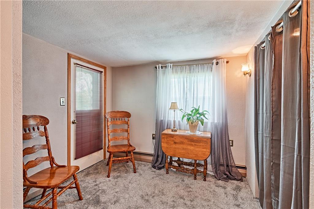 218 Evergreen Mill Road Harmony, PA 16037 - Photo 15 of 25 a room with table and chair