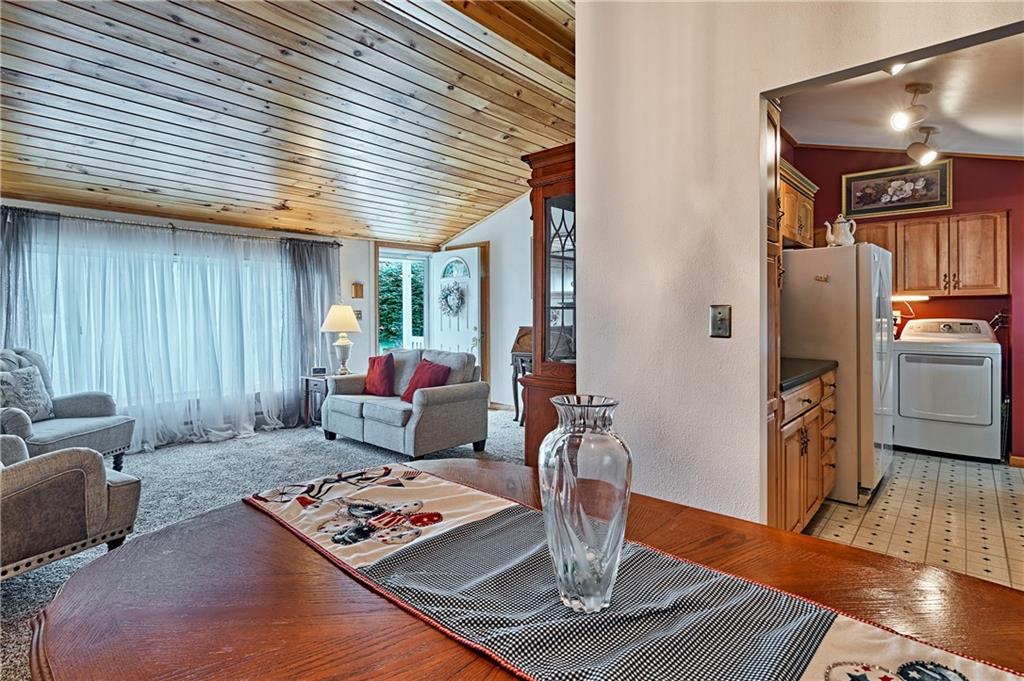 218 Evergreen Mill Road Harmony, PA 16037 - Photo 16 of 25 a living room with furniture and a table