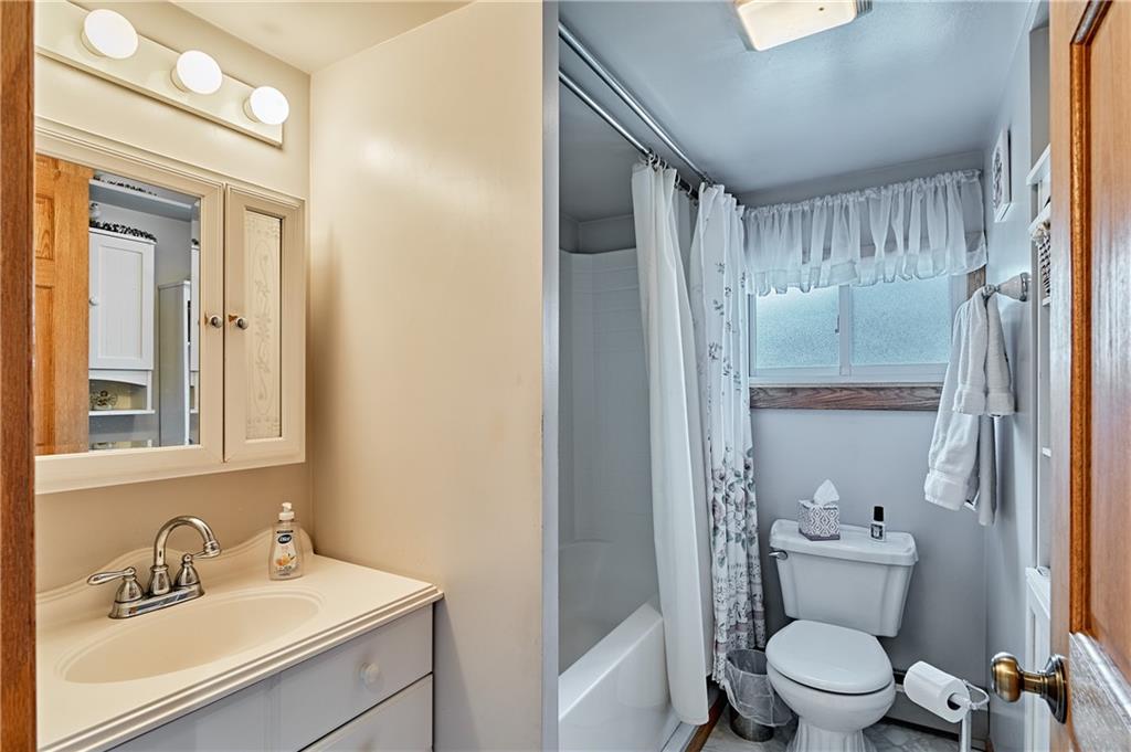 218 Evergreen Mill Road Harmony, PA 16037 - Photo 24 of 25 a bathroom with a sink a toilet and shower