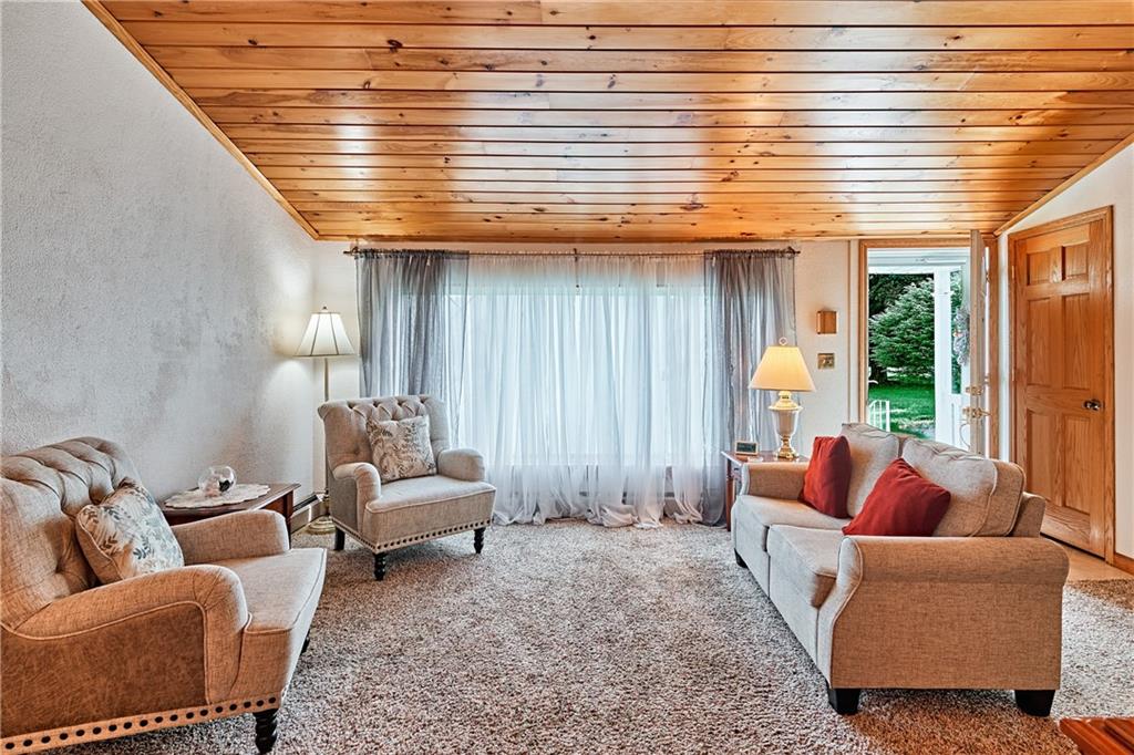 218 Evergreen Mill Road Harmony, PA 16037 - Photo 9 of 25 a living room with furniture and a large window