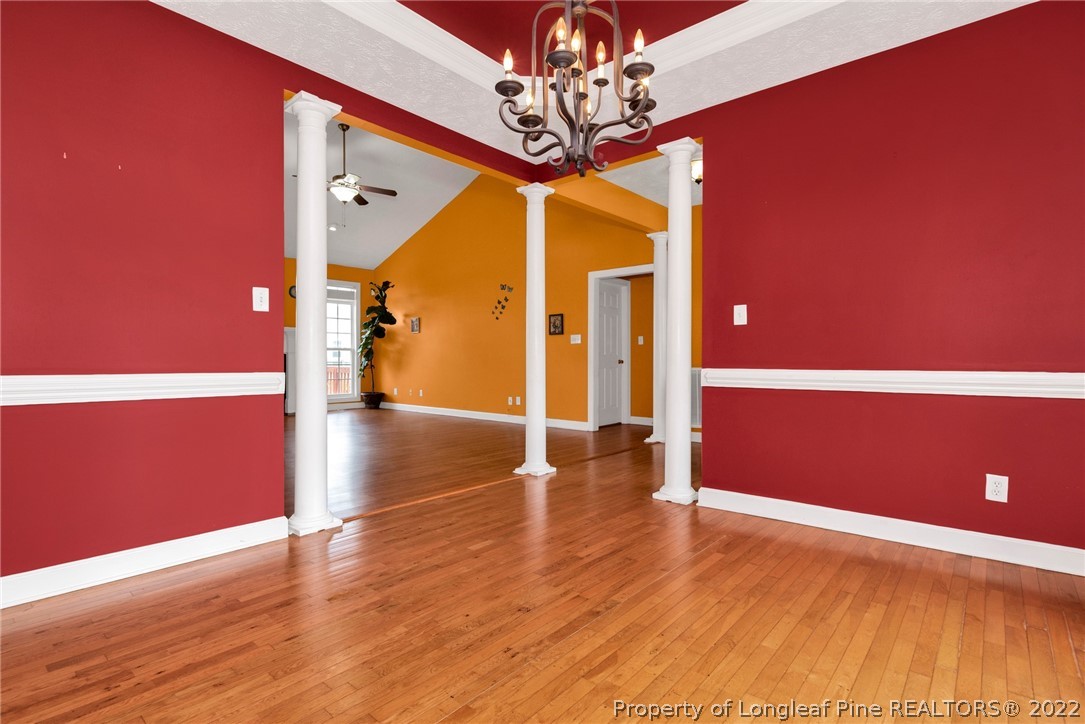 3540 Talus Road Fayetteville, NC 28306 - Photo 13 of 28 a view of a livingroom with wooden floor