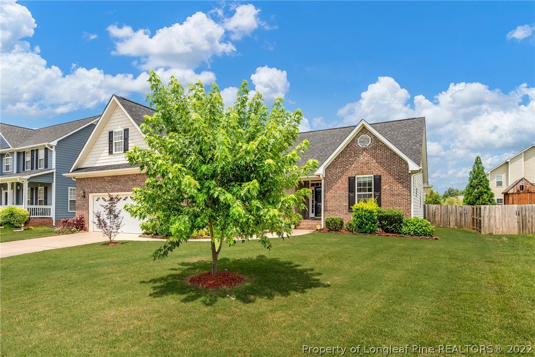 3540 Talus Road Fayetteville, NC 28306 - Photo 27 of 28 a front view of a house with garden