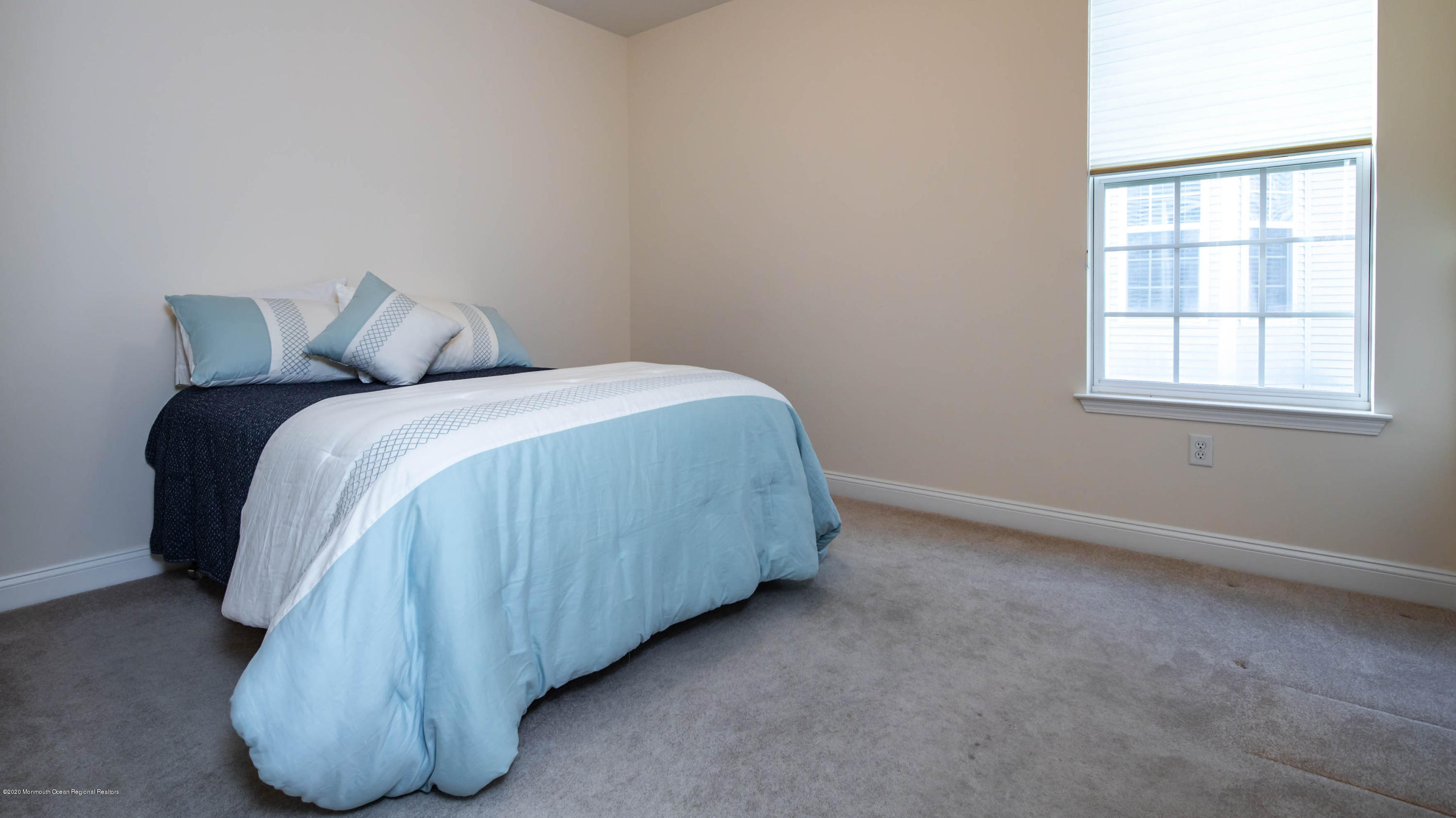 38 Hartack Road Manalapan, NJ 07726 - Photo 22 of 43 a bed room with a bed and a window
