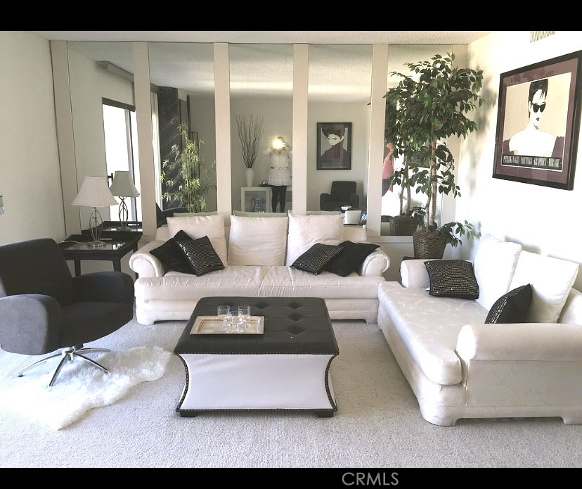 809 Temple Terrace Los Angeles, CA 90042 - Photo 2 of 46 a living room with furniture and a large window