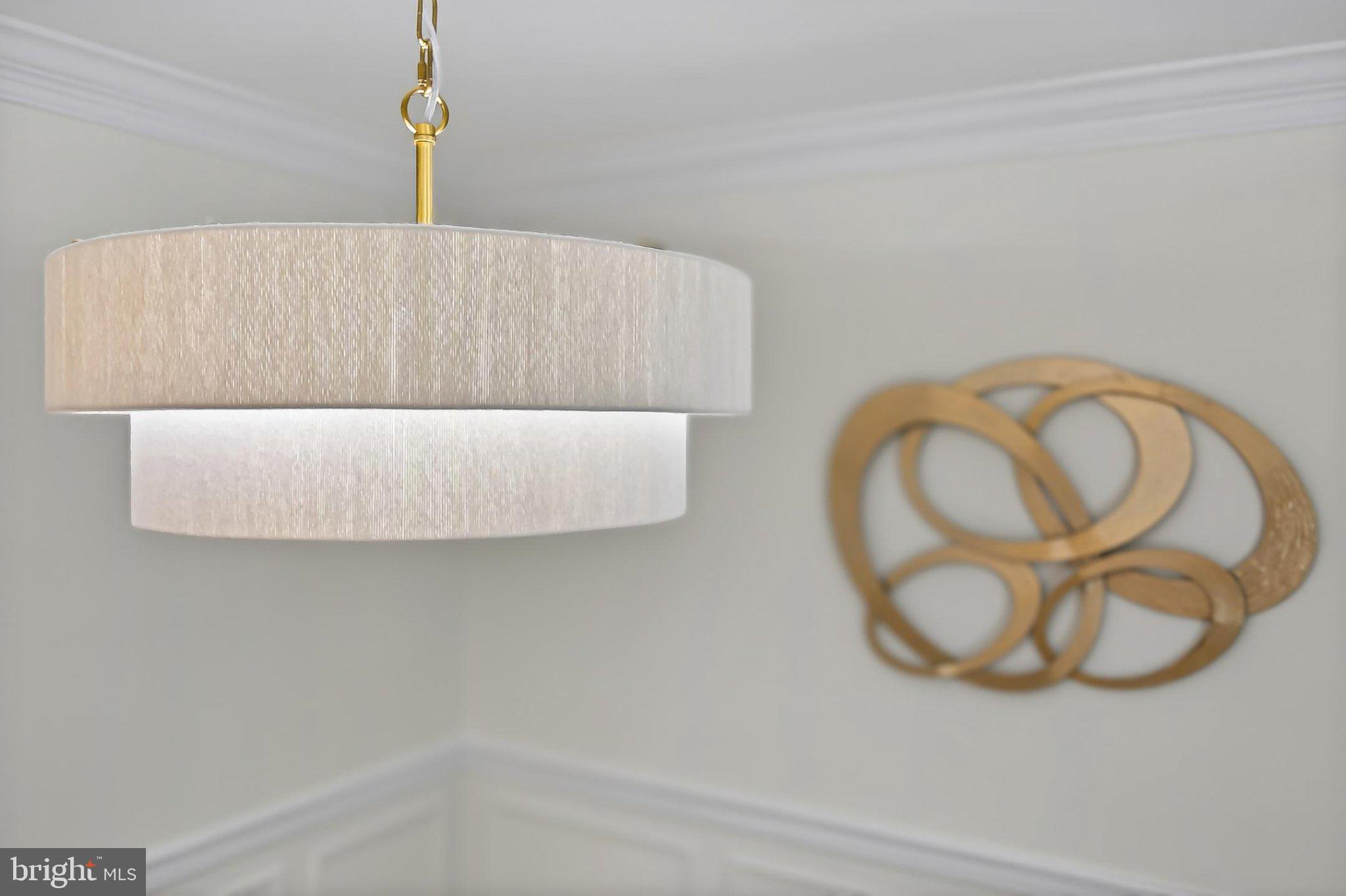 6908 Rochambeau Place Springfield, VA 22153 - Photo 16 of 70 Elegant light fixture and art blend.