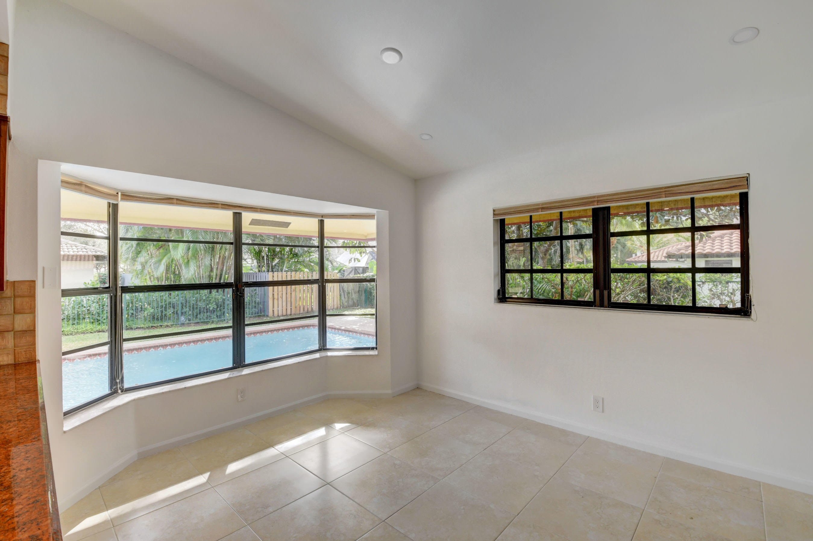 3230 St James Drive Boca Raton, FL 33434 - Photo 17 of 62 a view of an empty room with a window
